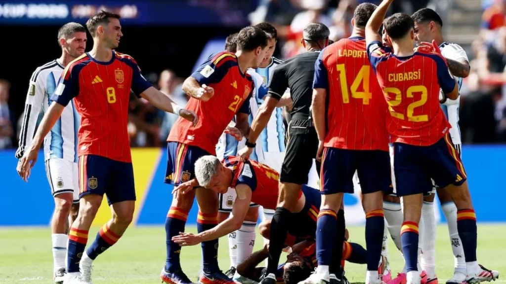 6a618e125e65d-keributan-di-laga-argentina-vs-spanyol_gemini_1265_711