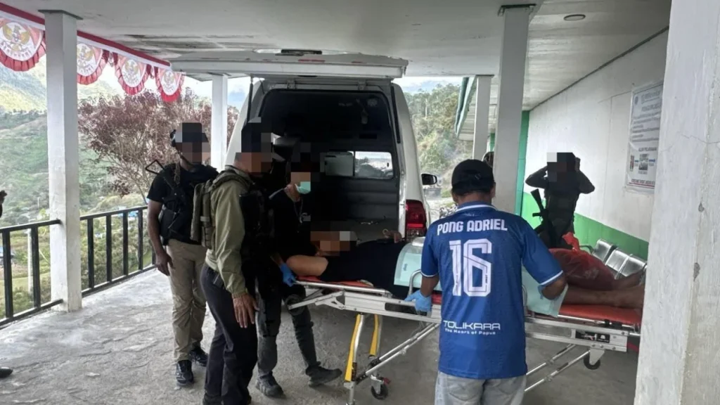 6a87e720ee9b2-seorang-personel-polsek-ilu-polres-puncak-jaya-bripda-jhon-galu-situmorang-tertembak_gemini_1265_711